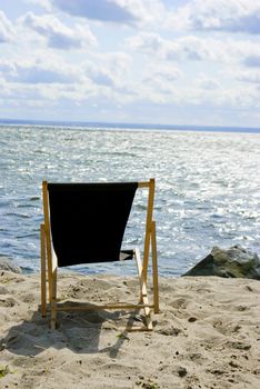 black chair on the beach 