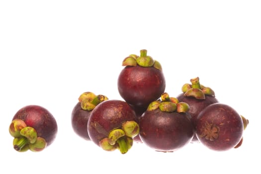 Isolated macro image of mangosteens.