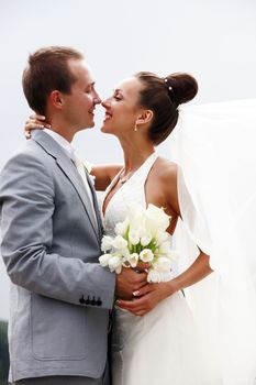 Newly-married couple in park