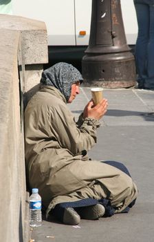 Beggar in the street in Paris