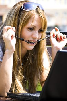 beautiful young woman working out with laptop or notebook