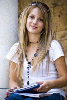 beautiful young blonde woman with flower