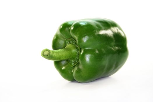 green peppers on a white background