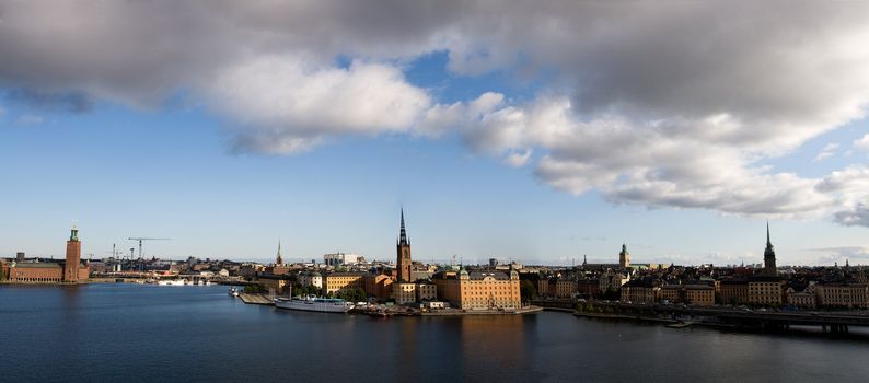 Panoramic view of Stockholm old town. Nice day with blue sky and white clouds