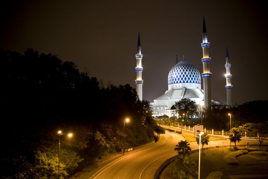 Night image of Sultan Salahuddin Abdul Aziz Shah Mosque or commonly known as the Blue Mosque, located at Shah Alam, Selangor, Malaysia. 