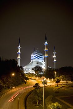 Night image of Sultan Salahuddin Abdul Aziz Shah Mosque or commonly known as the Blue Mosque, located at Shah Alam, Selangor, Malaysia. 