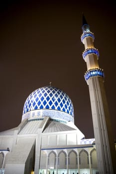 Night image of Sultan Salahuddin Abdul Aziz Shah Mosque or commonly known as the Blue Mosque, located at Shah Alam, Selangor, Malaysia. 