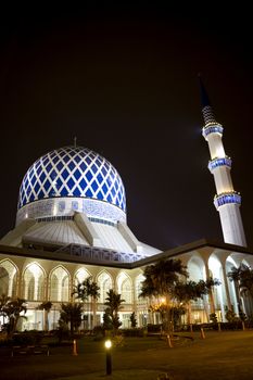 Night image of Sultan Salahuddin Abdul Aziz Shah Mosque or commonly known as the Blue Mosque, located at Shah Alam, Selangor, Malaysia. 