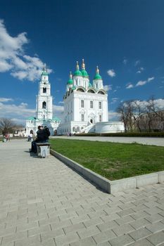 Picture is very beautiful building, on a background of sky and clouds