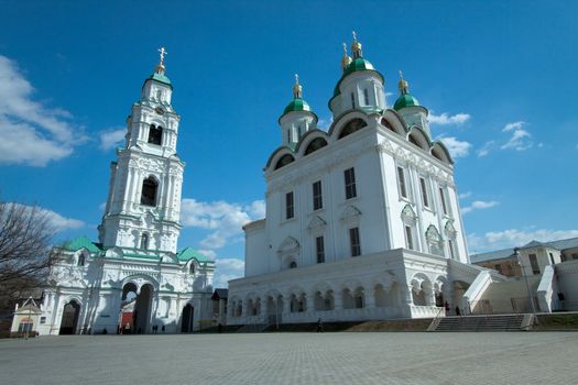 Picture is very beautiful building, on a background of sky and clouds