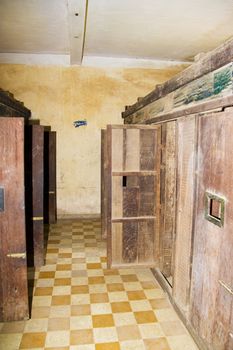 This is the actual tiny prison cells where many Cambodians were tortured and murdered by the Khmer Rouge. Formerly a school, converted into what was known as the notorious Security Prison 21 (S-21). About 17,000 people were interned here and only 12 survived. Now part of the Tuol Sleng Genocide Museum and it is in the same condition as when it was found by the liberating Vietnamese forces.