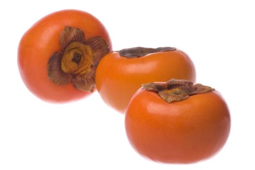 Isolated image of fresh persimmons.