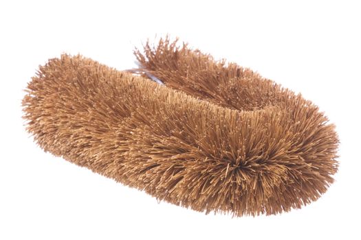Isolated image of a brown laundry washing brush.
