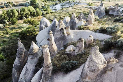 aerial view of semicircle of fairy chimneys, naturally weathered limestone with small ravene, copy space, crop area, landscape, vista