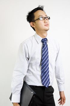  young man holding a laptop 