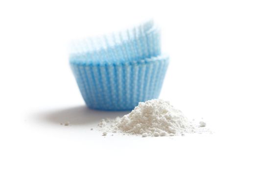 Baking powder isolated on a white background