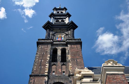 Tower of the historic Westerkerk (Western church) in Amsterdam, Netherlands.