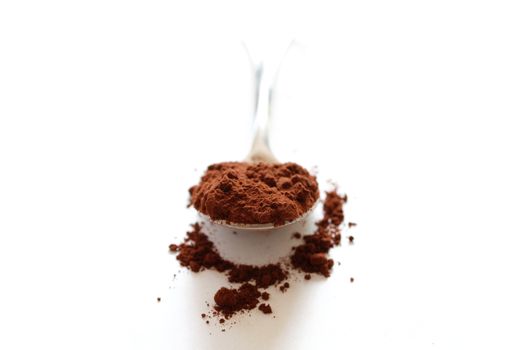 Cocoa powder isolated on white