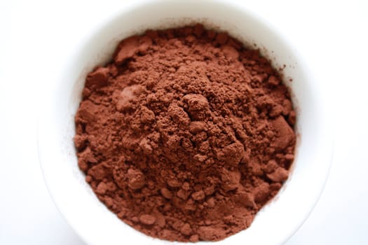 Cocoa powder isolated on white