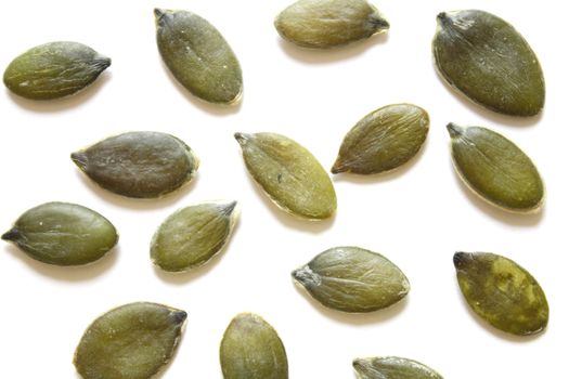 Pumpkin seeds on an isolated bg