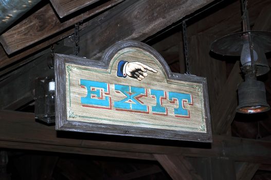 Exit sign, far west style, at amusement park.