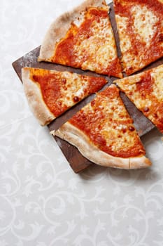 An italian pizza sliced