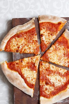 An italian pizza sliced
