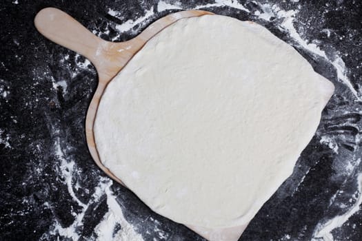 Flat white pizza dough