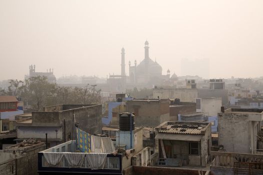 Muslim mosque in Delhi old cycle market at dusk