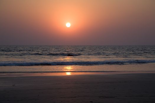 Sunset on the beach in north Goa near the ocean