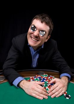 Man in black suit take a jackpot in casino