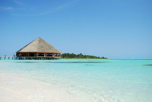 beautiful tropical beach and wooden bungalow in Maldives