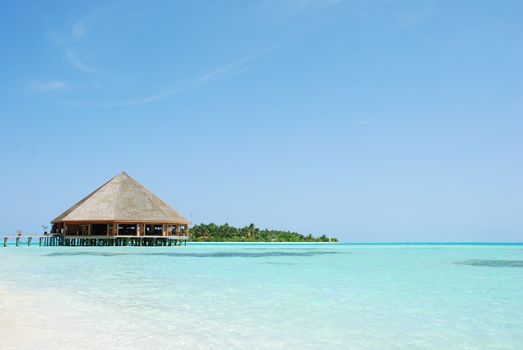 beautiful tropical beach and wooden bungalow in Maldives