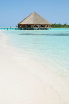 beautiful tropical beach and wooden bungalow in Maldives