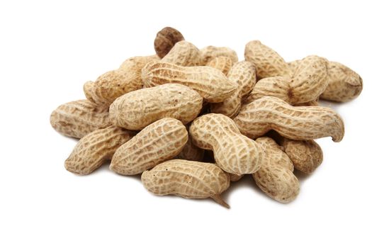 Few peanuts isolated on white background. Close up image