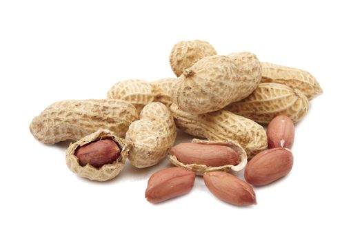 Close-up of group peanuts on white background