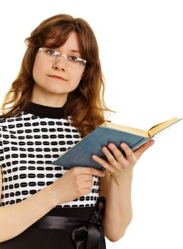 Young beautiful woman in glasses with a textbook in the hands of