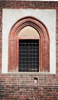 Details on roman window in Milan, Italy