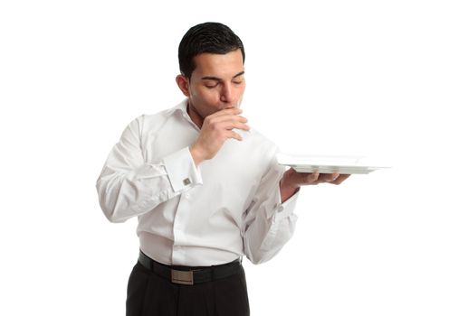 A delighted waiter holding plate and showing love kissing hand in gesture of perfection and love.