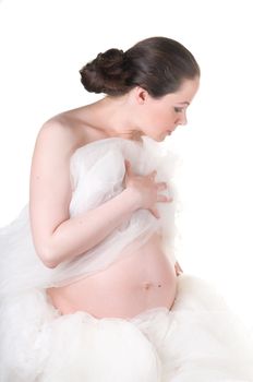 Shot of beautiful pregnant woman isolated on white