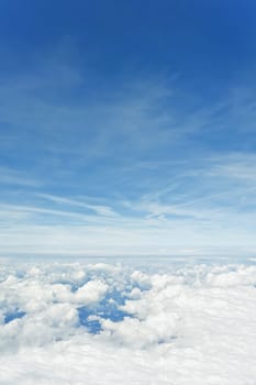 An image of a flight over the clouds