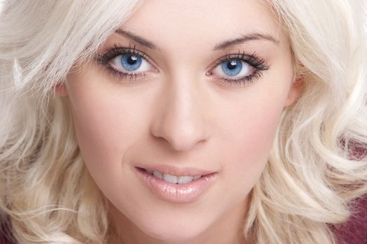 Beautiful smiling blond woman closeup