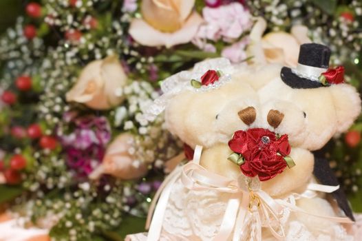 Wedding bears with flowers as background