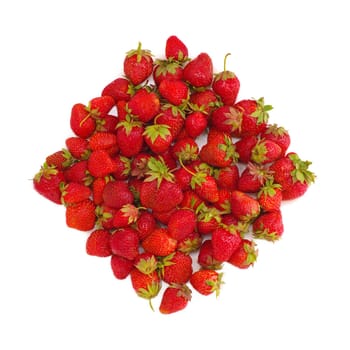 many ripe red strawberry in form of rhomb on white isolated