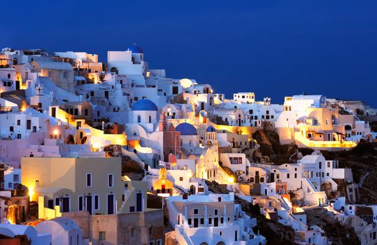 The village of Oia at dusk, on the beautiful island of Santorini, Greece