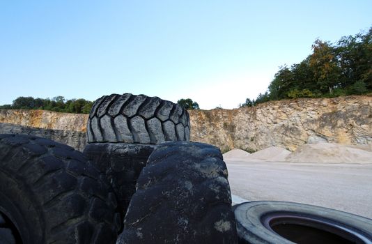 Old truck tires in a stone quarry in south western Germany