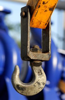 Image shows a hook from an industrial crane