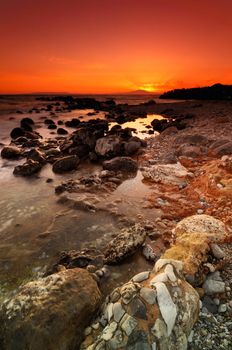 Spectacular sunset over a dramatic rocky seascape in Mani peninsula, southern Greece