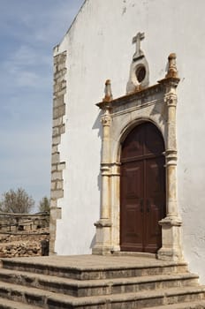 Church door inside the castle of Castro Marim, Algarve, Portugal