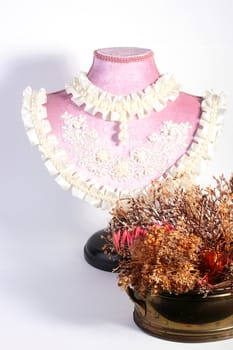 The decorative dummy for a house or boutique ornament, can be used for storage of pins and needles.